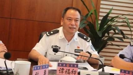 主动投案的谭队长 牵出系统性腐败