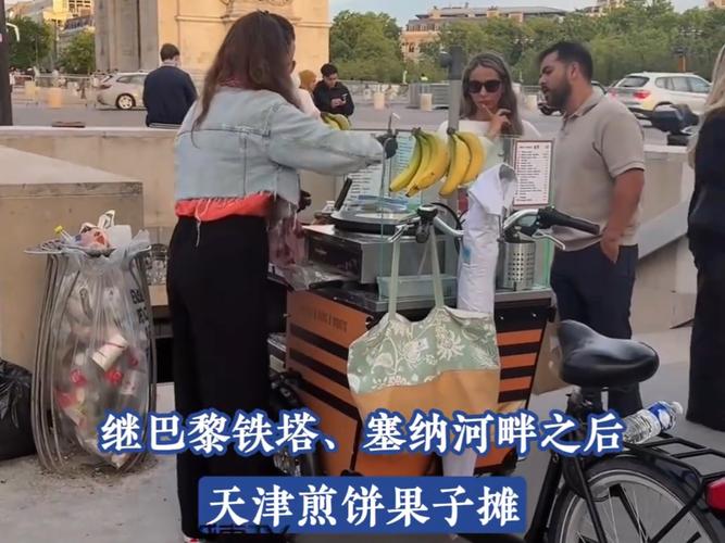 上合峰会外国记者体验天津煎饼果子